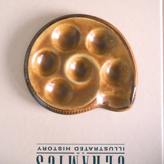 Äggfat Formad som En Snäcka